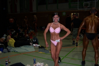 Tanja Baumann Posing - front view, left hand on hip